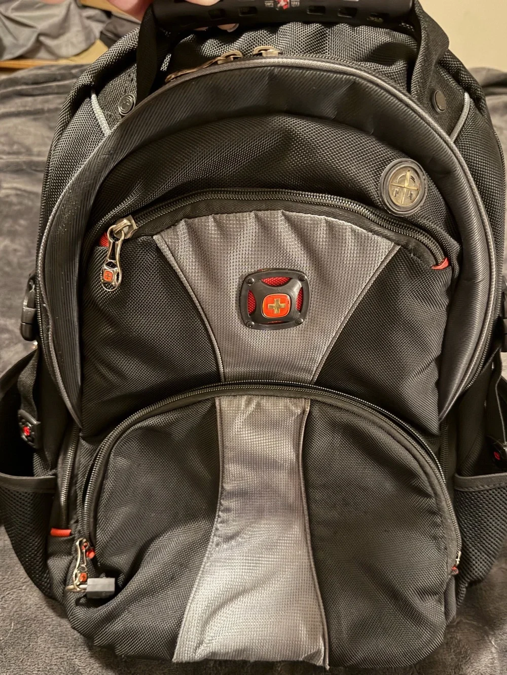 SwissGear Black and Gray Backpack with Red Accents